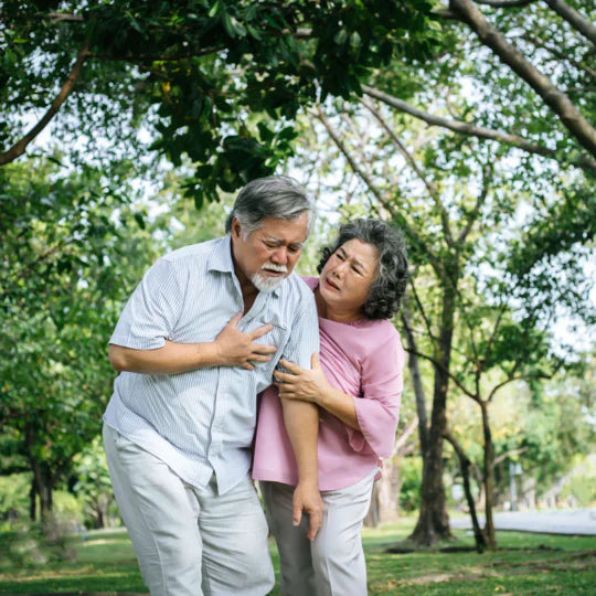 Senior Man Suffering Having Chest Pain